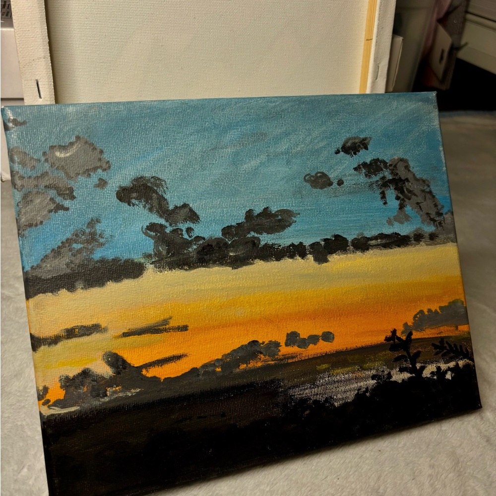 Vibrant Blue and Orange Sunset Landscape Painting